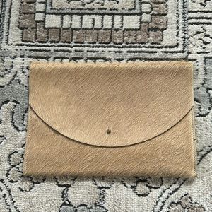 Calf hide clutch